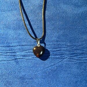 Black sparkly hart pendant necklace.